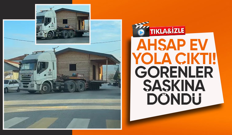 Ahşap evi tırla taşıdılar