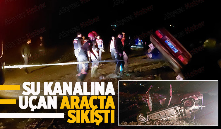 Akyazı'da kanala uçan araçta sürücü sıkıştı