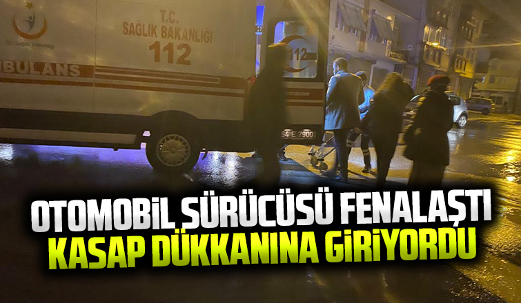 Akyazı'da otomobil kasap dükkanına giriyordu