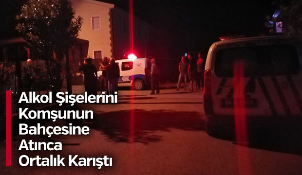 Komşusunun bahçesine alkol şişesi attı