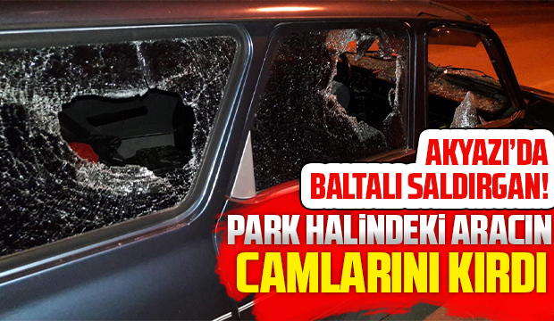 Baltayla aracın camlarını kırdı