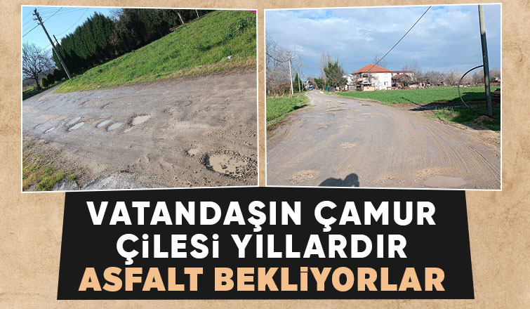 Çamur içindeki sokakta yürümek zorundalar