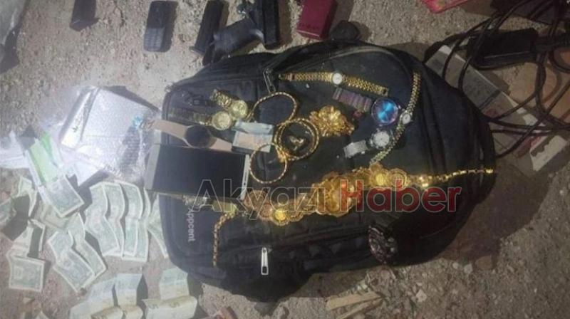 Deprem bölgesinden dönen komiser yardımcısı çalıntı altın ve paralarla yakalandı