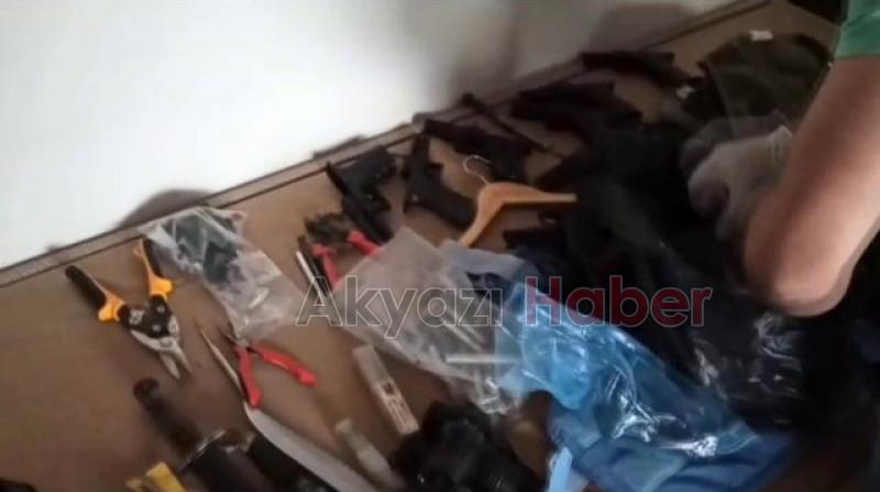 Onlarca silah ve balistik yelek ele geçirildi