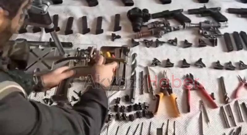 Onlarca silah ve balistik yelek ele geçirildi