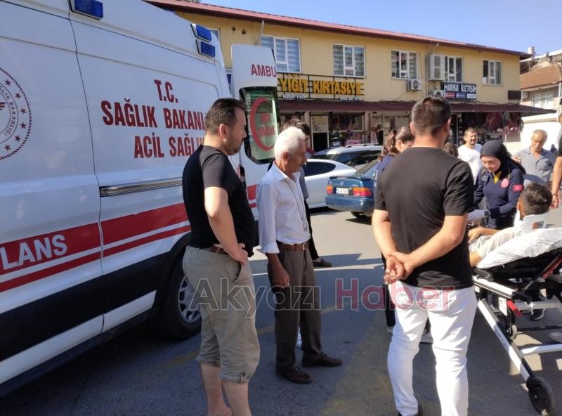 Araca çarpan motosikletli yaralandı