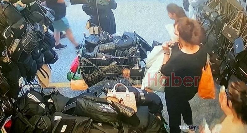 Birbirleri ile işaretleşip çantayı işte böyle çaldılar