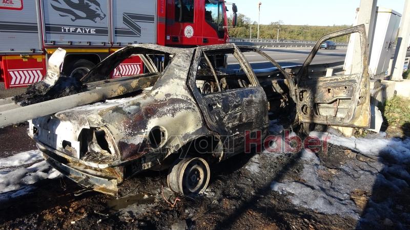 Bariyerin içinden geçen otomobil alev aldı: 3 kişi sağ kurtuldu
