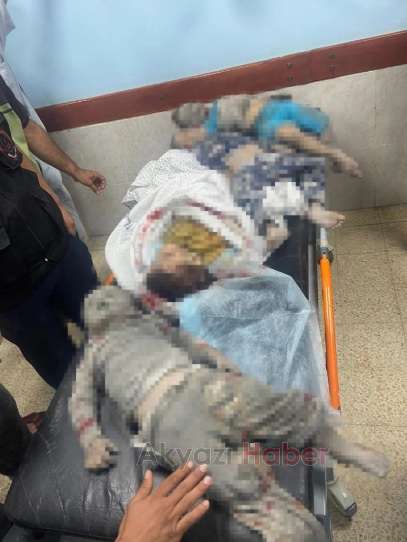 Filistinli doktor, katledilen çocukların başında dünyaya isyan etti
