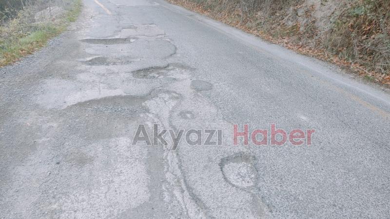 Dokurcun'da çukur içindeki yollara tepki