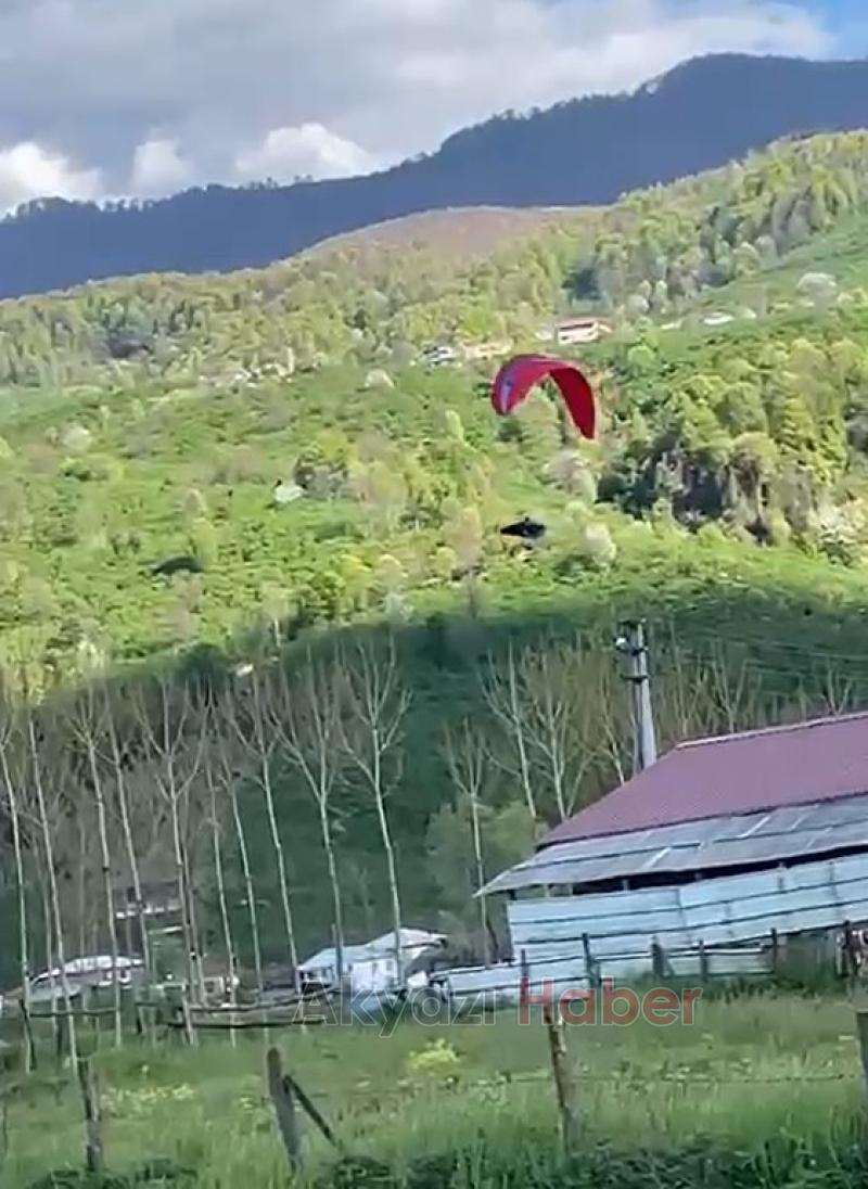 Yamaç paraşütçüsü tarlaya iniş yaptı