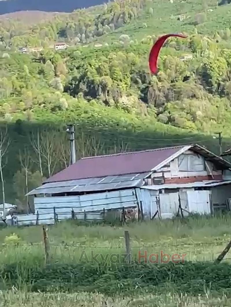 Yamaç paraşütçüsü tarlaya iniş yaptı