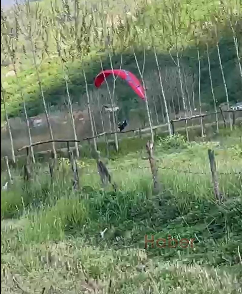 Yamaç paraşütçüsü tarlaya iniş yaptı