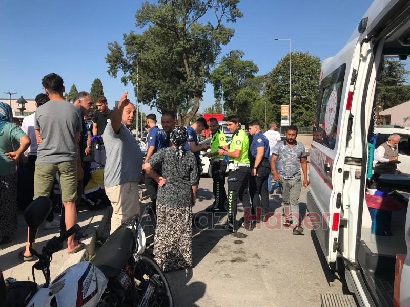 Otomobille çarpışan motosikletteki 2 kişi yaralandı