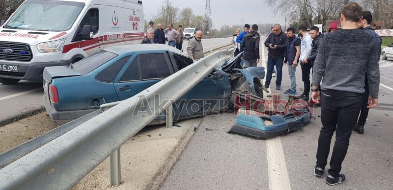 Bariyerlere saplanan araçtan sağ çıktı