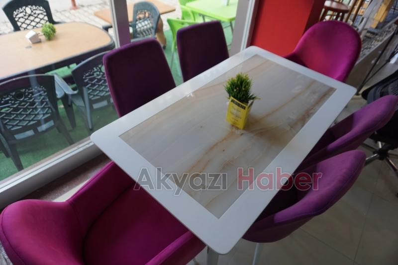 Buyrun Sizi Masaya Alalım