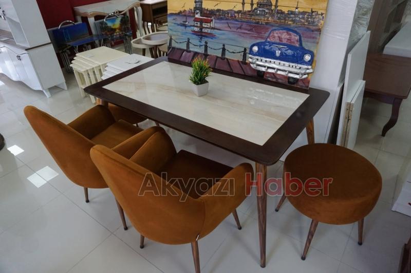 Buyrun Sizi Masaya Alalım