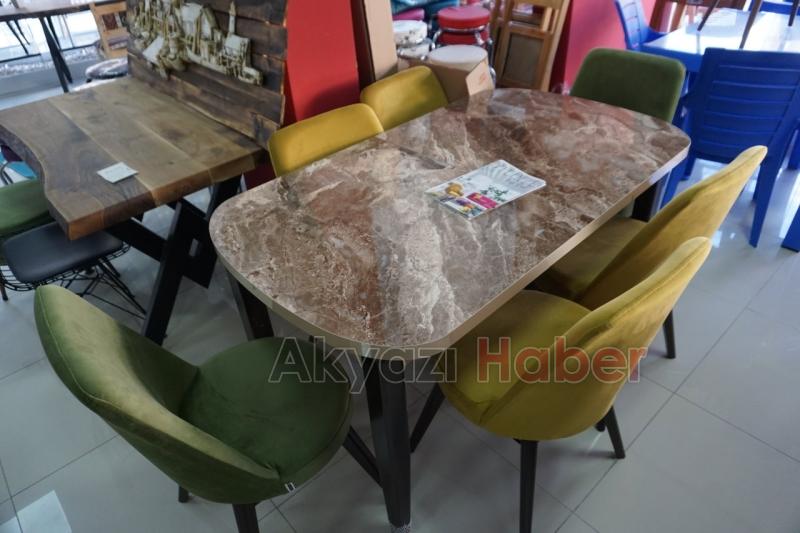 Buyrun Sizi Masaya Alalım