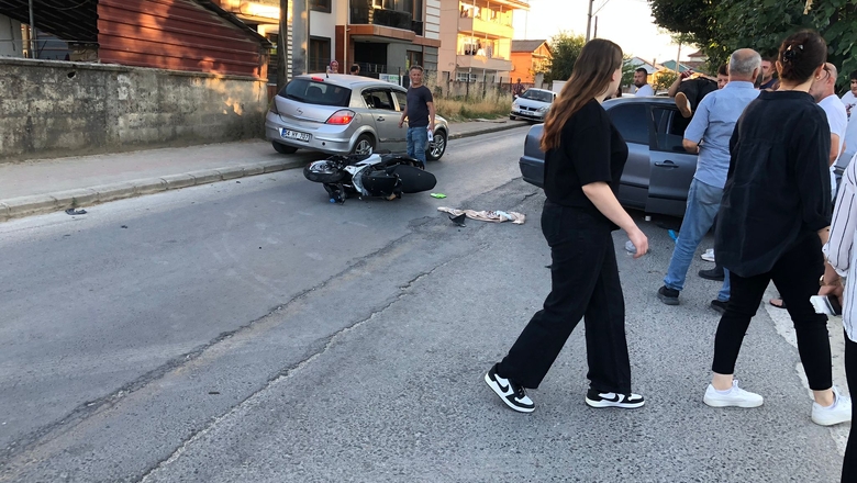 Çarpıştığı otomobilin tavanının üzerine düştü
