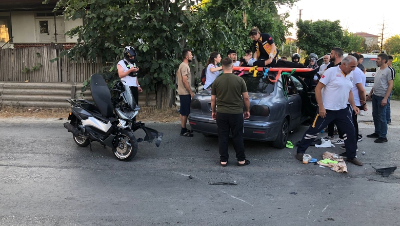 Çarpıştığı otomobilin tavanının üzerine düştü