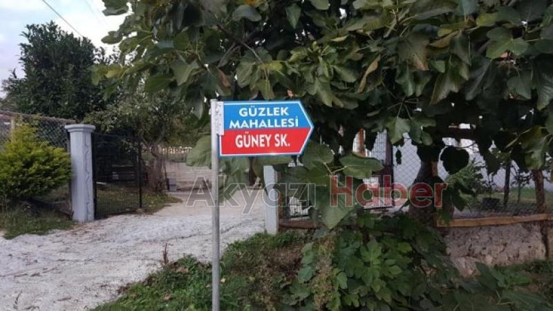 Güzlek mahalle muhtarlığından Örnek bir çalışma daha Sokak tabelaları yenileniyor