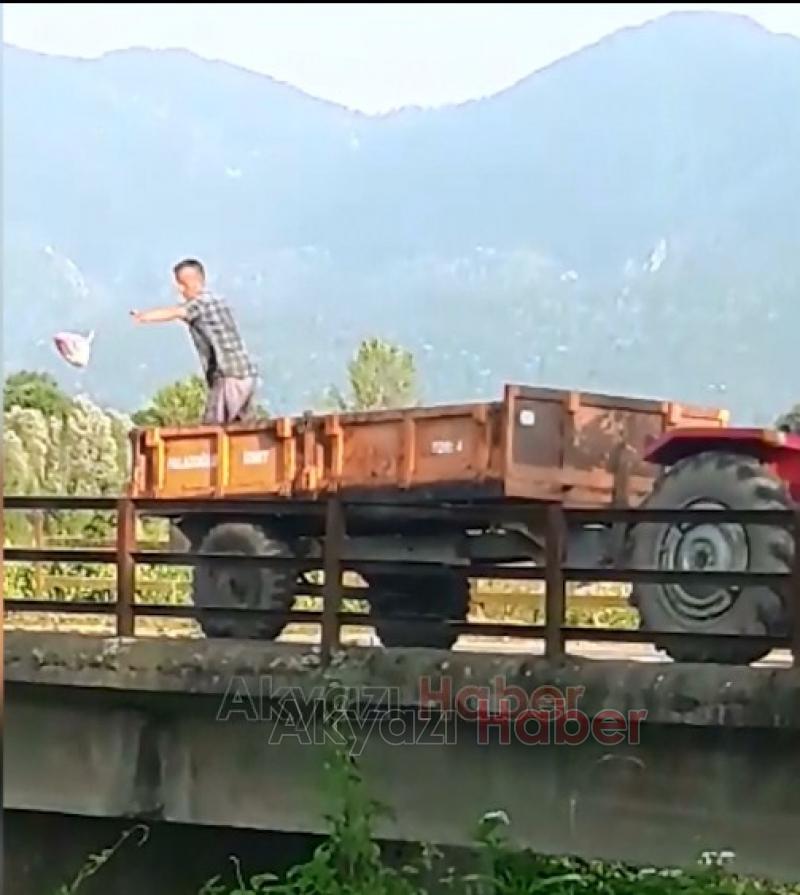 Kurban atıklarını traktörle getirip Dereye attı