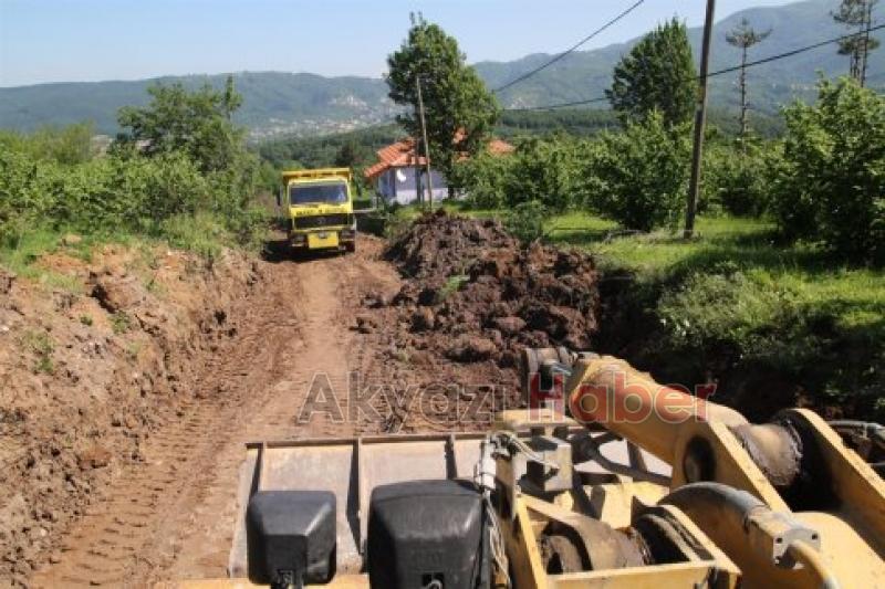 Kuzuluk Mahallesinde Yol Açma ve Malzeme Serimi