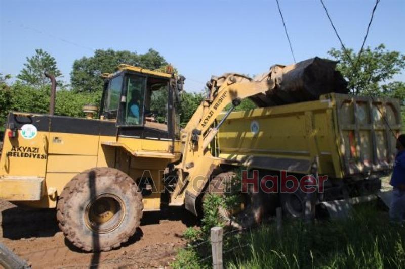 Kuzuluk Mahallesinde Yol Açma ve Malzeme Serimi