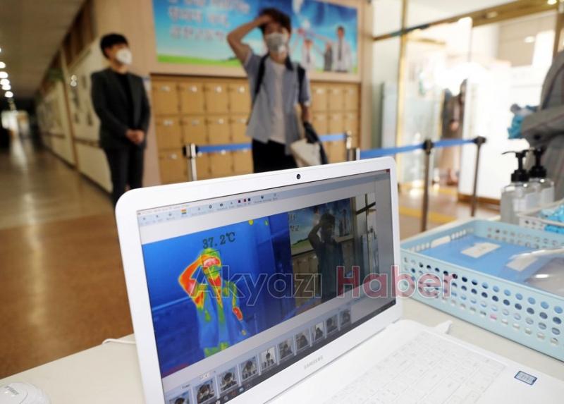 Örnek ülkede okullar açıldı: Böyle önlem aldılar