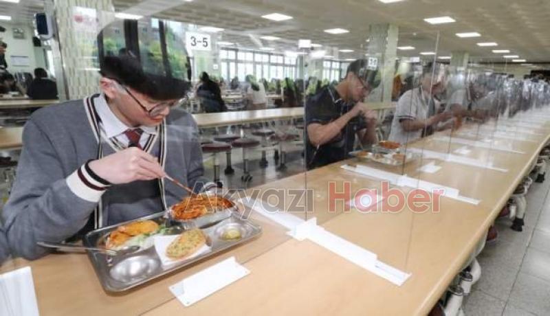 Örnek ülkede okullar açıldı: Böyle önlem aldılar