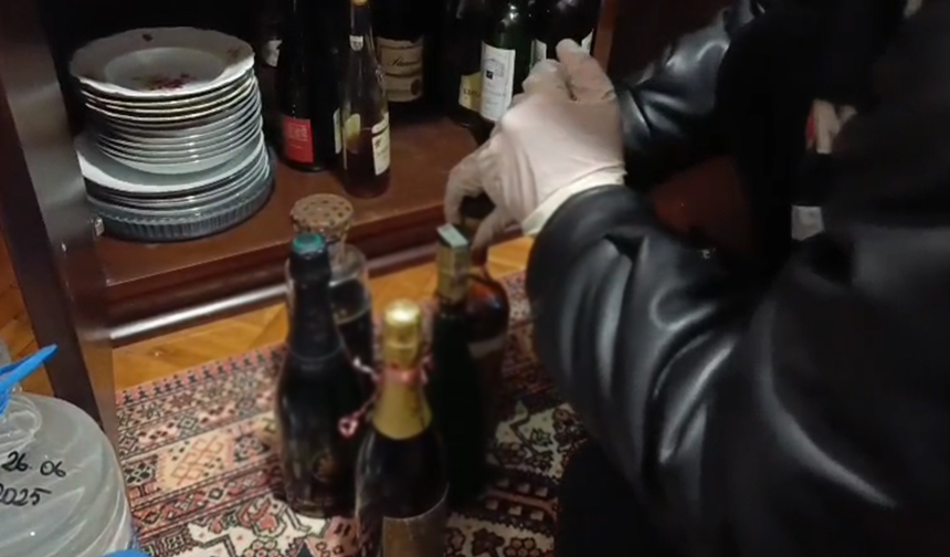 Sahte içki imalathanesine baskın kamerada