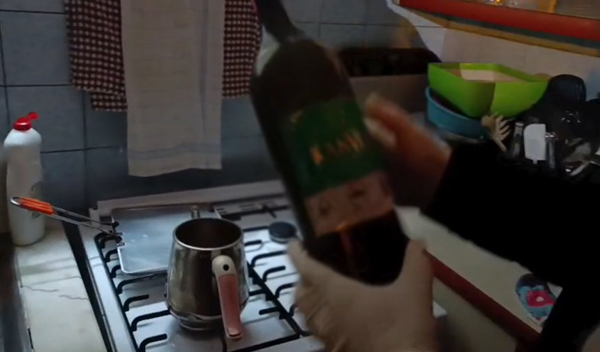 Sahte içki imalathanesine baskın kamerada