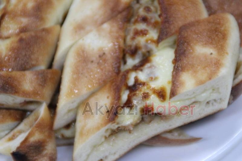 Tamamen Doğal Kardeşler Pide ve Börek Salonu Hizmetinizde