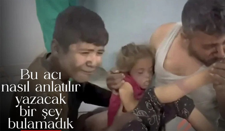 Gazze de acılı baba saldırıda kaybettiği kızını son kez öptü