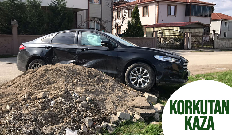 Kazaya karışan araç molozların üzerine çıktı