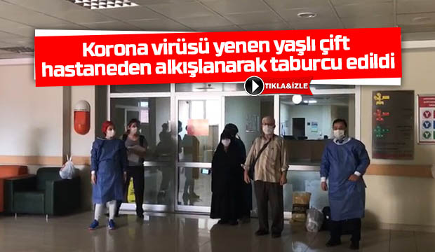 Korona virüsü yenen yaşlı çift hastaneden alkışlanarak taburcu edildi
