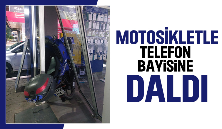 Motosiklet telefon bayisine girdi