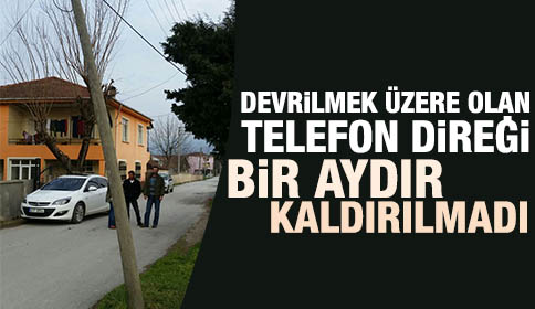 Devrilmek Üzere Olan Telefon Direği Bir Aydır Kaldırılmadı