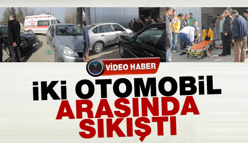 İki otomobilin Arasında Sıkıştı