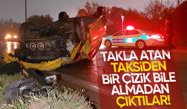 Ölüm kavşağında taksi takla attı
