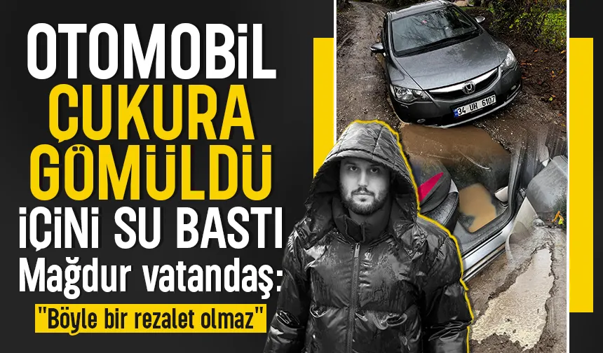 Otomobil dev çukura gömüldü