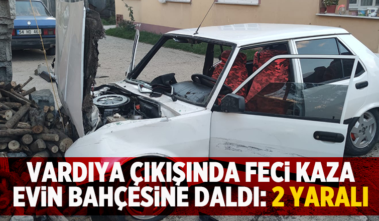 Otomobil evin bahçesine daldı: 2 yaralı