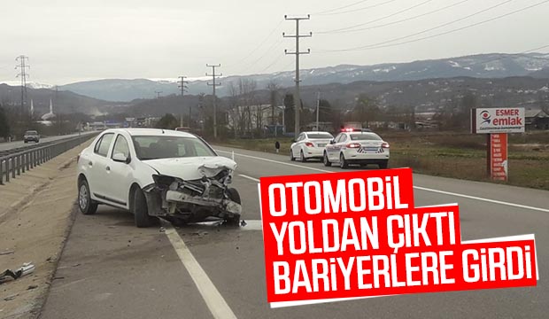 Otomobil yoldan çıktı bariyerlere girdi