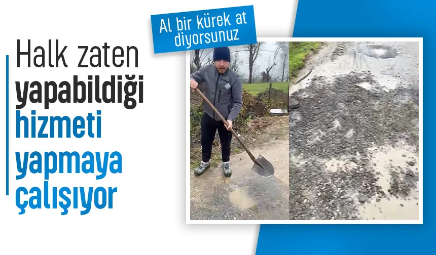 Taşağıl'da bayram günü vatandaş yoldaki çukurları kapatıyor