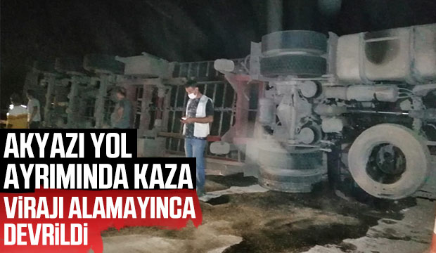 Tır virajı alamadı devrildi