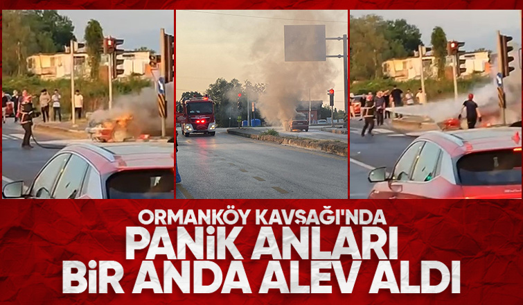 Trafik ışıklarında duran otomobil yandı