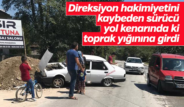 Yoldan Çıkan Otomobil Toprak Yığınına Girdi