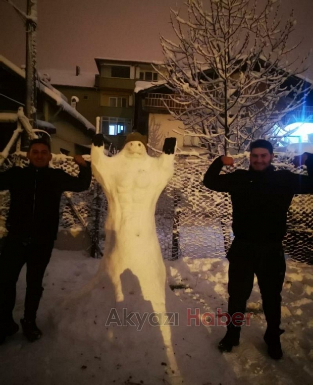 Şehirden kardan adam fotoğrafları