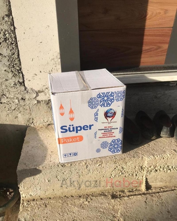 Taşburun Gençlik Kulübü Ramazan Kolisi dağıttı