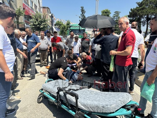 Aracın aynasının çarptığı motosikletli düşüp yaralandı